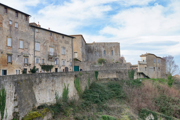 Fototapeta premium Volterra, Italy. Ancient medieval buildings on a winter day