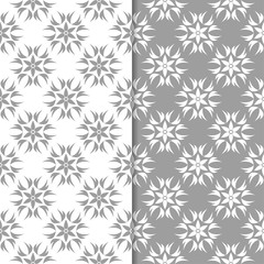 Fototapeta na wymiar White and gray set of floral seamless patterns