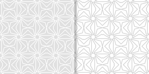 Fototapeta premium Light gray geometric ornaments. Set of seamless patterns