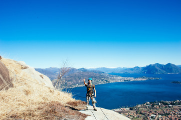 Obraz premium Italy-Baveno-Piedmont-10 March 2017-mountaineer along via ferrata, Picasass