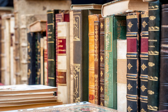 Old books background. Books in a row.