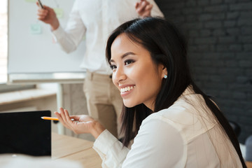 Business woman talking with colleague