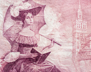 Young lady with umbrella portrait on old spainish 100 pesetas banknote close-up