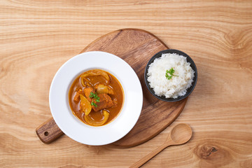 Chicken curry in a bowl / Vietnam chicken curry on wooden background
