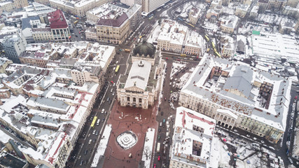 February, 2018 - Lviv, Ukraine. Top View of Lviv City Centre in snow from above in winter. Lviv national theatre.