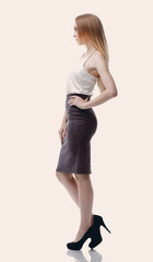 side view. young modern woman. photo in full growth
