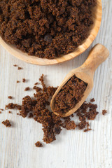 molasses sugar on wooden surface