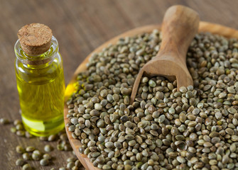 hemp seed oil on wooden surface