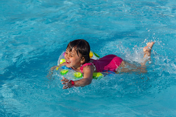 little girl in the swimming pool