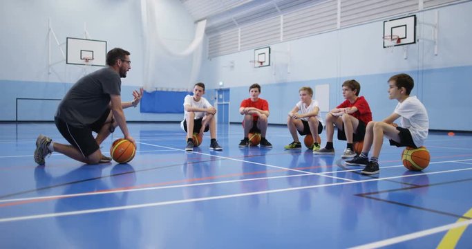 4k, School children in physical education class indoors.