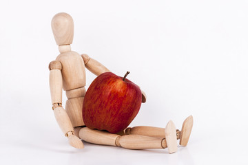 Puppet with red apple