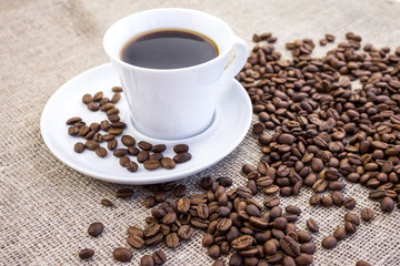 Cup of coffee in burlap