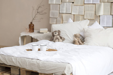 Fototapeta na wymiar cup of coffee on wooden table in bedroom