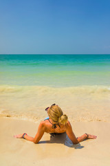 Fototapeta na wymiar woman resting at the tropical Thailand Railay beach