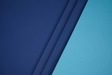 dark and bright blue geometric paper background