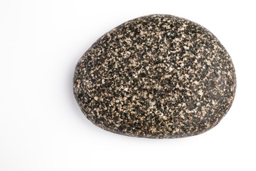 One stone on a white background.