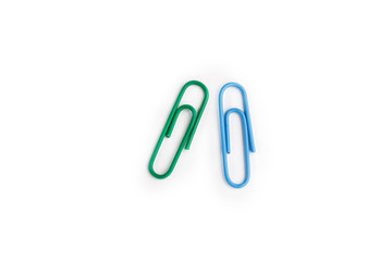 A lot of colorful paper clips on white background.