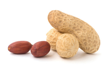Dried peanuts on the white background.