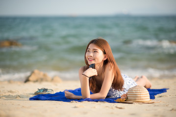 Pretty woman at the beach