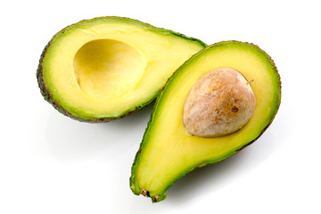 Ripe avocado slices isolated on white background, Half of avocado on white.