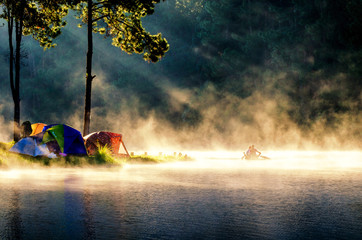 morning in pang oung with the light and shadow and steam over the lake in meahongson,Thailand
