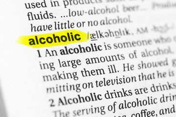Highlighted English word "alcoholic" and its definition in the dictionary