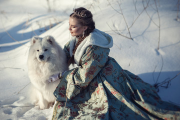 Fairy girl with a white dog