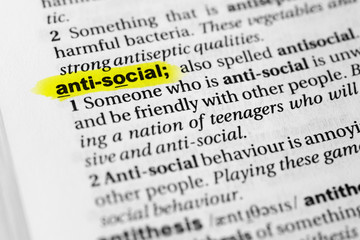 Highlighted English word "anti social" and its definition in the dictionary