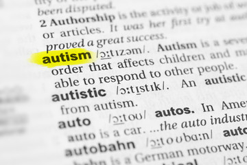 Highlighted English word "autism" and its definition in the dictionary