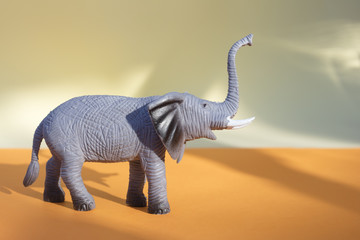 Obraz premium African elephant figurine made of plastic