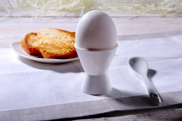 Morning Breakfast set with egg and bread toast on white background.