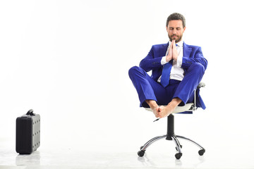 Businessman gets rid of stress and relaxing after hard day.
