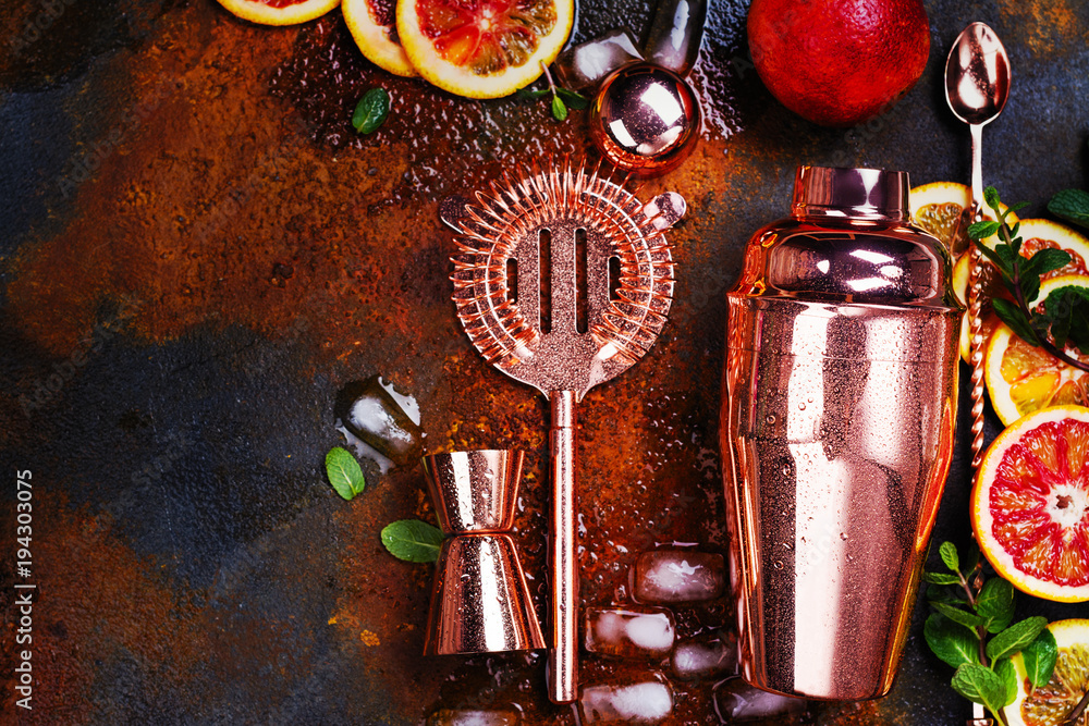 Wall mural bar accessories, drink tools and cocktail ingredients on rusty stone table. flat lay style