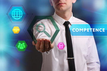 Business, Technology, Internet and network concept. Young businessman working on a virtual screen of the future and sees the inscription: Competence