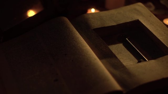 The book is a cache with an iron key inside