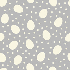 Seamless pattern with white Easter egg shapes and polka dots or confetti
