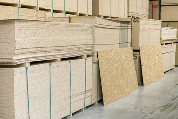 Warehouse of fiberboard and chipboard. Construction Materials. Wooden warehouse