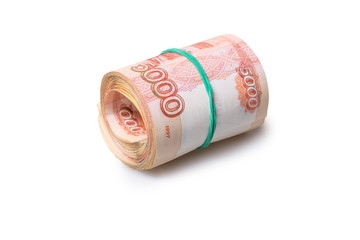 Roll of five thousand roubles banknotes isolated on white background