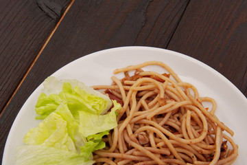 Spaghetti with nuts and dried tomatoes