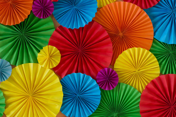 Fototapeta na wymiar Colorful birthday celebration background wall with multicoloured paper circles