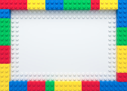 Frame of colorful toy bricks