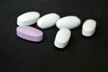 Obraz na płótnie Canvas Medication pills of different colors.