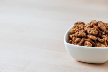 Walnut kernels in a bowl.