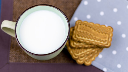 Obraz na płótnie Canvas A cup of milk and cookies.