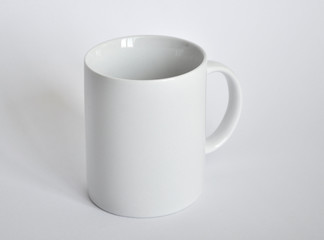 Obraz premium White cup on a white