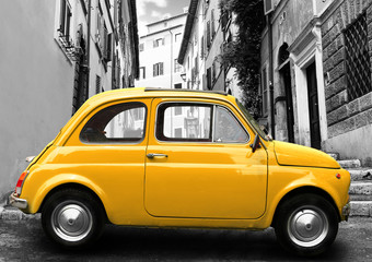 Retro car on background of street in Rome Italy