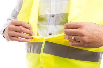 Constructor hands closing velcro reflective protective vest.