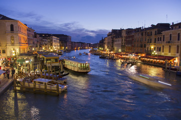 Fototapeta na wymiar Grand Canal in Venice, Italy. Night scene from Rialto Bridge