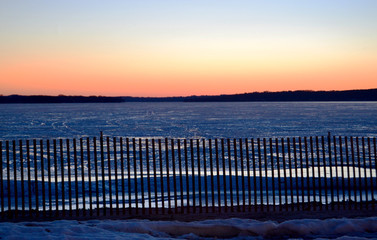 Last light on closed beach
