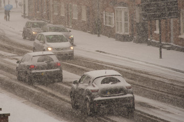traffic in travel chaos on road in blizzard conditions UK